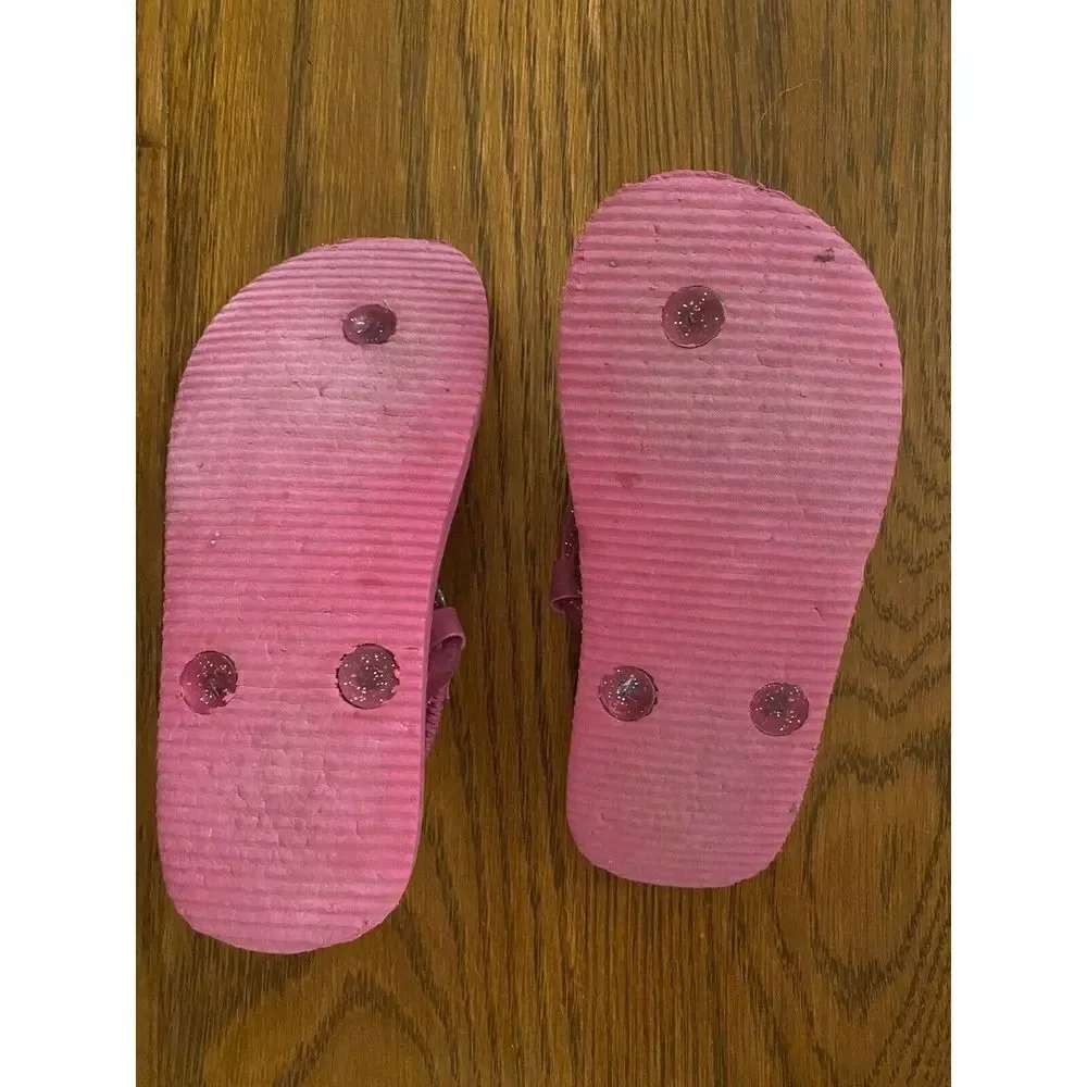 Frozen girls pink glittery flip flops